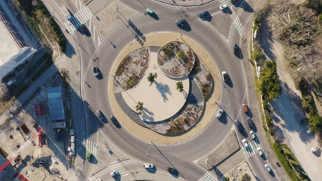 Aerial-drone-view-of-a-roundabout-with-traffic-France-circular-camera-movement